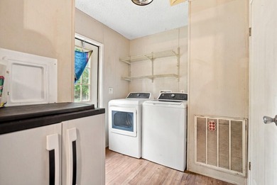 This spacious 3-bedroom, 2-bathroom home offers a bright - photo 18