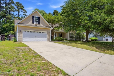 Welcome to 103 Southern Magnolia Court, located in the desirable - photo 3
