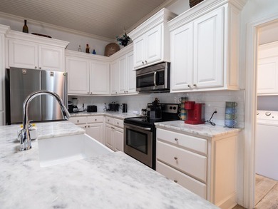 Built in 2013, this 4-bedroom, 2-bath home is one of the newer - photo 11