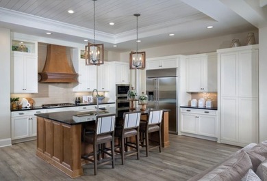 Experience elevated waterfront living in this stunning new - photo 4