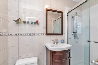 Welcome to Manhasset! Move right into this beautiful Split level - photo 14