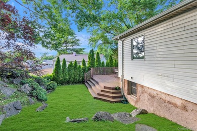 Welcome to Manhasset! Move right into this beautiful Split level - photo 21