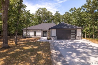 Lake Home For Sale in Sunrise Beach, Missouri