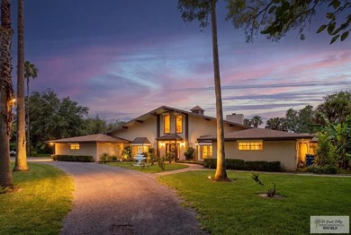 Nestled in the heart of San Benito, this stunning resaca-front - photo 1