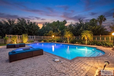 Nestled in the heart of San Benito, this stunning resaca-front - photo 6