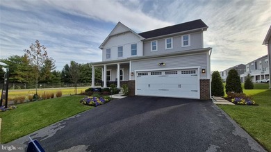 Exquisite Former Model Home with Premium Upgrades & Water Views - photo 2