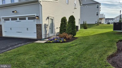 Exquisite Former Model Home with Premium Upgrades & Water Views - photo 3