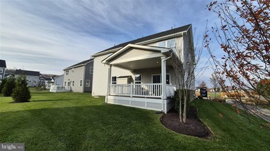 Exquisite Former Model Home with Premium Upgrades & Water Views - photo 4