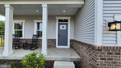 Exquisite Former Model Home with Premium Upgrades & Water Views - photo 5