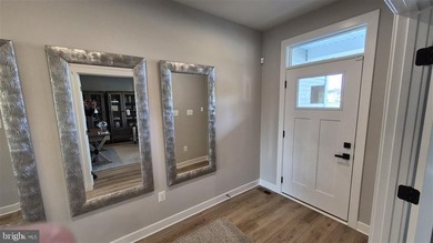 Exquisite Former Model Home with Premium Upgrades & Water Views - photo 7