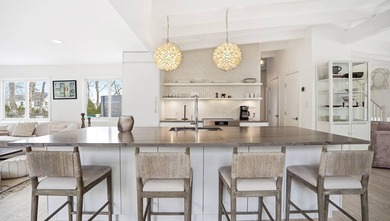 Freshly updated and effortlessly stylish, this Sag Harbor - photo 5