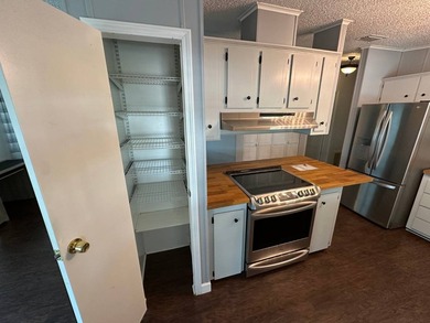 This well maintained and clean 2 bedroom 2 bath home is in - photo 3