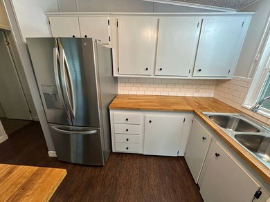This well maintained and clean 2 bedroom 2 bath home is in - photo 6
