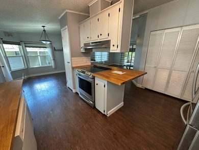 This well maintained and clean 2 bedroom 2 bath home is in - photo 7