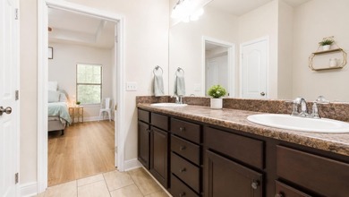 Experience luxurious pond-front living in this beautifully - photo 11