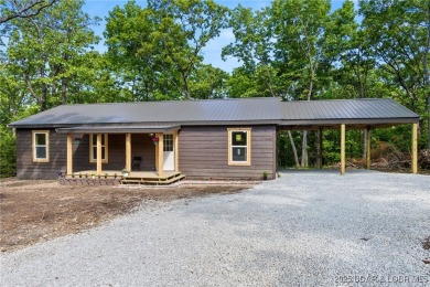 Lake Home For Sale in Edwards, Missouri