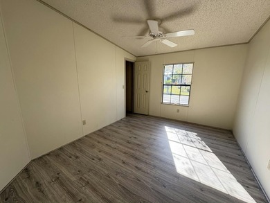 Bright and inviting corner-lot home featuring brand-new flooring - photo 8