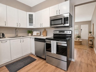TOP-FLOOR UNIT! 2-story block construction condo built like a - photo 3