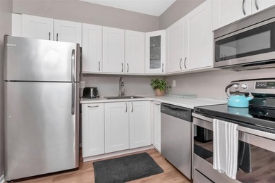 TOP-FLOOR UNIT! 2-story block construction condo built like a - photo 6