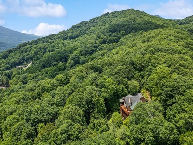 Experience elevated mountain living in this exceptional Post & - photo 11