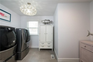 Gorgeously updated, deep waterfront luxury coastal home - photo 32