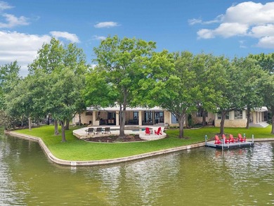 Set along 395 feet of Lake LBJ waterfront in Horseshoe Bay, 115 - photo 1