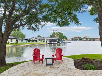 Set along 395 feet of Lake LBJ waterfront in Horseshoe Bay, 115 - photo 2