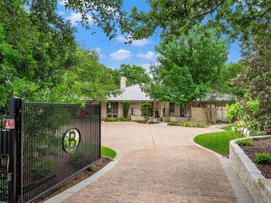 Set along 395 feet of Lake LBJ waterfront in Horseshoe Bay, 115 - photo 3