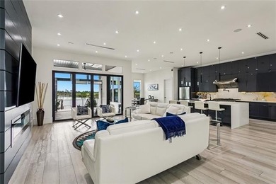 Experience true waterfront luxury in Lakeshore Estates with this - photo 11