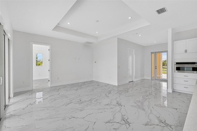 Virtually Staged. Discover luxury coastal living in this - photo 12