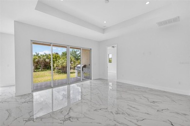 Virtually Staged. Discover luxury coastal living in this - photo 13