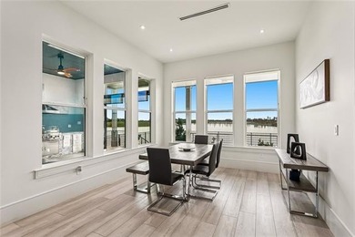 Experience true waterfront luxury in Lakeshore Estates with this - photo 14
