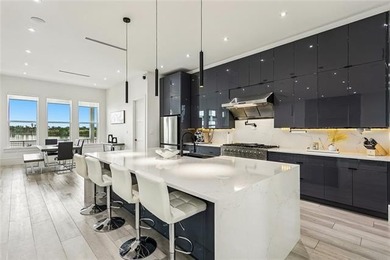 Experience true waterfront luxury in Lakeshore Estates with this - photo 15