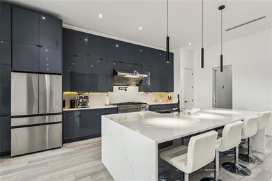 Experience true waterfront luxury in Lakeshore Estates with this - photo 18