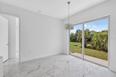 Virtually Staged. Discover luxury coastal living in this - photo 22