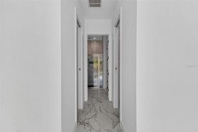 Virtually Staged. Discover luxury coastal living in this - photo 27