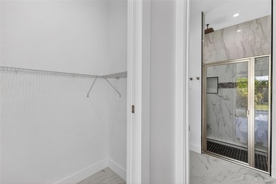 Virtually Staged. Discover luxury coastal living in this - photo 29