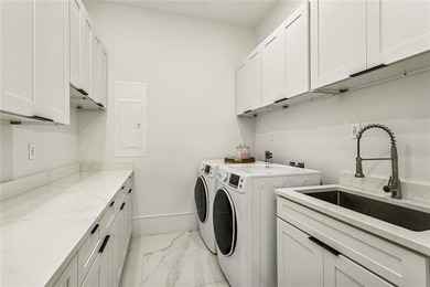 Experience true waterfront luxury in Lakeshore Estates with this - photo 33