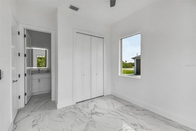 Virtually Staged. Discover luxury coastal living in this - photo 35
