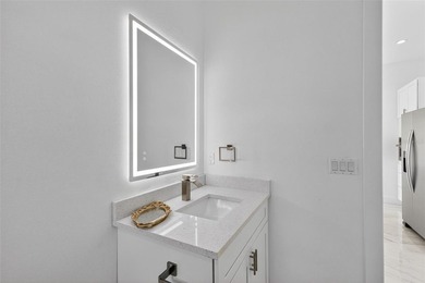 Virtually Staged. Discover luxury coastal living in this - photo 42