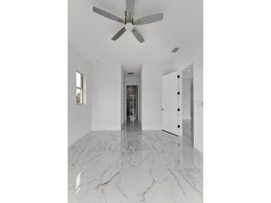 Virtually Staged. Discover luxury coastal living in this - photo 49