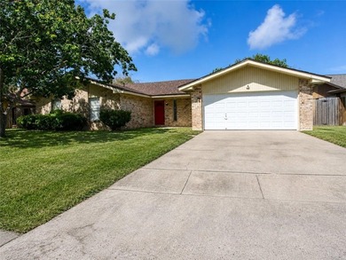 This spacious three-bedroom home features four-sided brick, a - photo 1