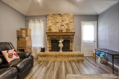 This spacious three-bedroom home features four-sided brick, a - photo 6
