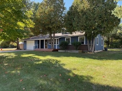 Antrim County Chain of Lakes Home For Sale in Bellaire Michigan