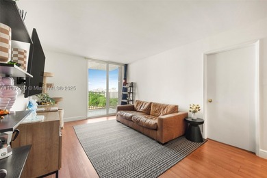 Sleek city living meets unmatched convenience in this updated - photo 11