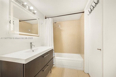 Sleek city living meets unmatched convenience in this updated - photo 16