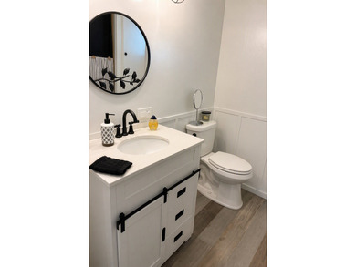 This spacious unfurnished double-wide home offers 2 bedrooms and - photo 4