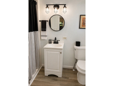 This spacious unfurnished double-wide home offers 2 bedrooms and - photo 5