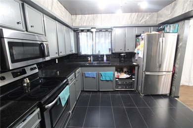 Spacious 4 bedroom home with 2.5 baths. Master bedroom is - photo 8