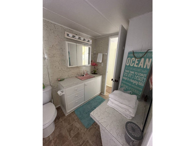 Charming vintage 2-bedroom, 1-bath mobile home located on an - photo 10